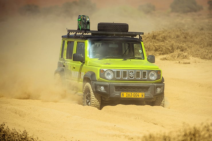 4x4 Suzuki Jimny, cruising in deep sand, Namibia