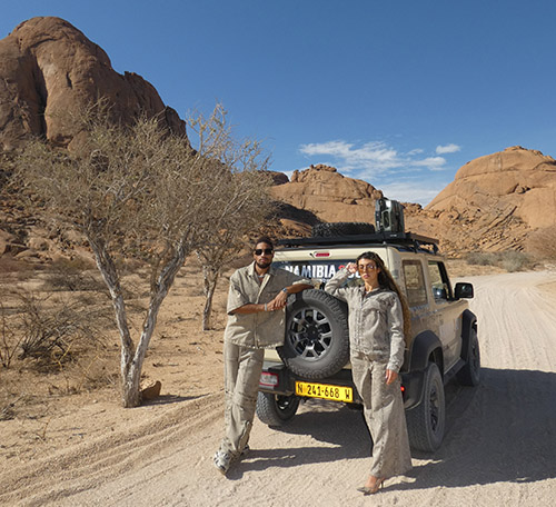 Driving in Namibia, couple with Suzuki Jimny, photo by IJEKDRIP