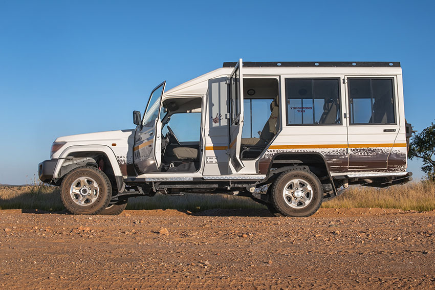 4x4 Safari Cruiser with open doors, rental car, Namibia