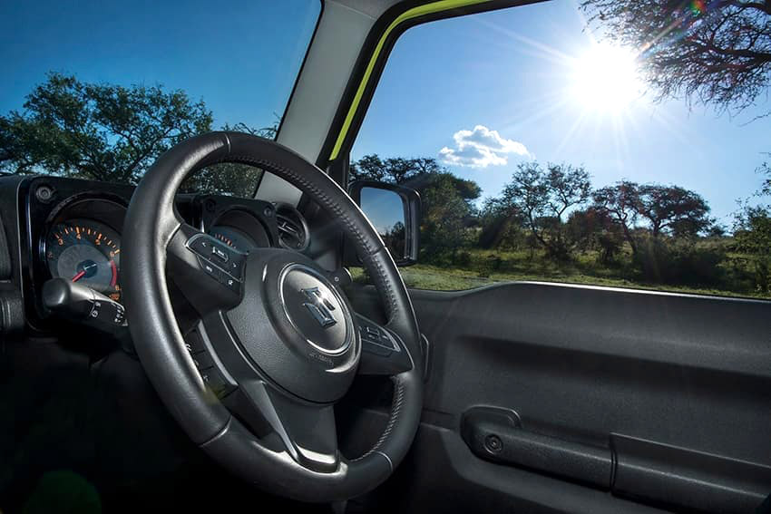 Suzuki Jimny rental car, dashboard and steering wheel, Namibia